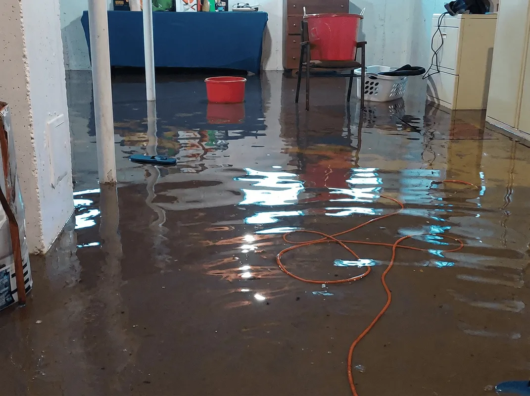 Basement with boiler, cabinets and washing machine completely flooded in Newark, NJ